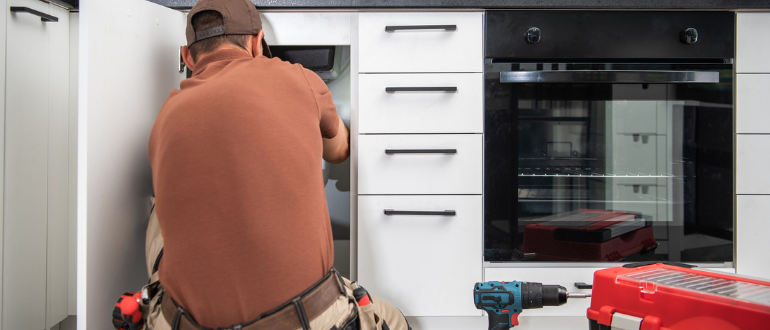 tradesperson plumber tools kitchen sink